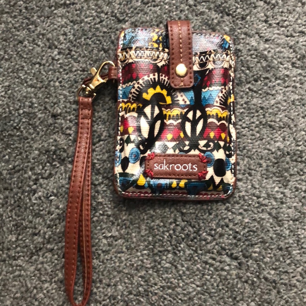 Never used- Sakroots wristlet